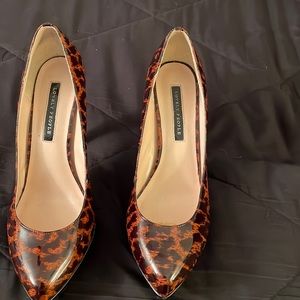 🔥Sale🔥nice patent leather animal print on a black platform and a 4” heel..EUC